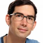 Profile picture from Holger. Glases, brown, short Hair and blue shirt
